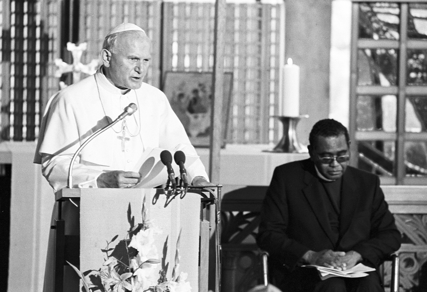 Pope St. John Paul II speaks during a visit to the World Council of Churches in Geneva June 12, 1984. Also pictured is the Rev. Philip Potter, general secretary of the WCC. Pope Francis is scheduled to attend an ecumenical prayer service and meeting at the WCC during a one-day visit to Geneva June 21.